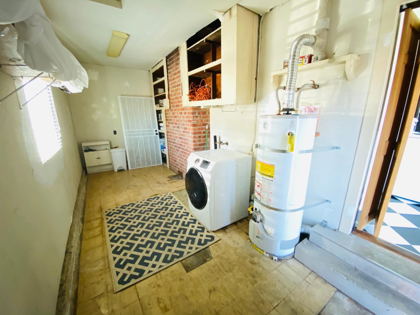 15107 Woodard Road San Jose, CA 95124 - Photo 15 of 20 a bathroom with a sink toilet and shower
