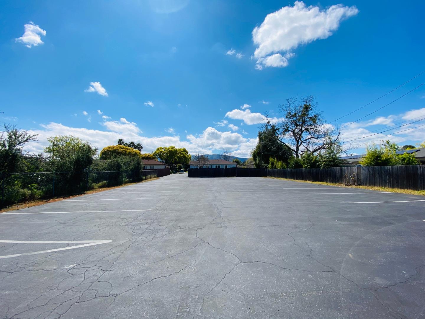 15107 Woodard Road San Jose, CA 95124 - Photo 19 of 20 a view of a house with a yard and basketball court