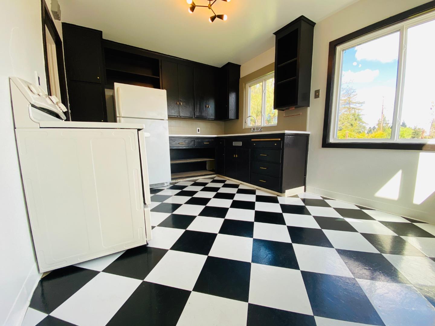15107 Woodard Road San Jose, CA 95124 - Photo 8 of 20 a black and white checkered floor with a black white checkered floor
