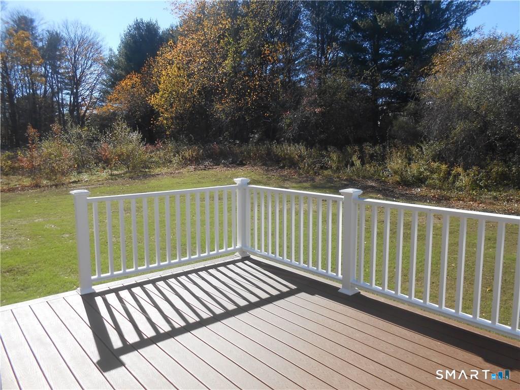 823 A Stone Road Windsor, CT 06095 - Photo 32 of 38 a view of balcony with wooden floor