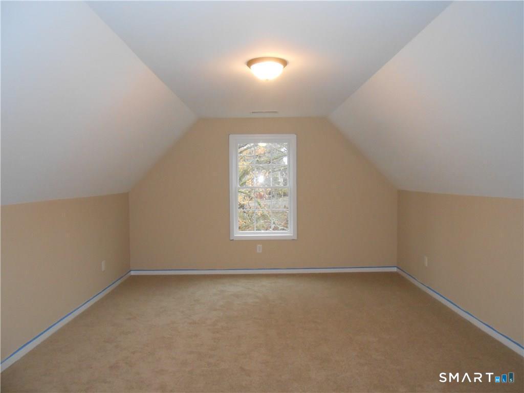823 A Stone Road Windsor, CT 06095 - Photo 34 of 38 an empty room with a window