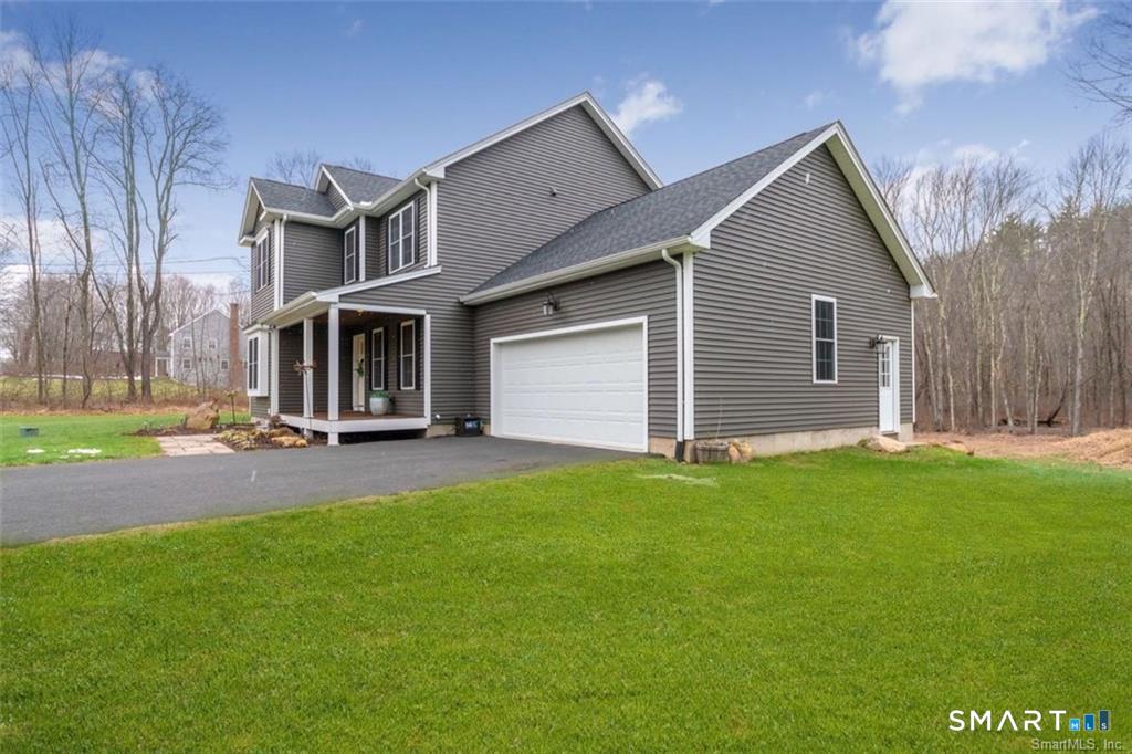 823 A Stone Road Windsor, CT 06095 - Photo 6 of 38 a view of a house with a yard