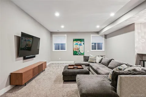 a living room with furniture and a couch