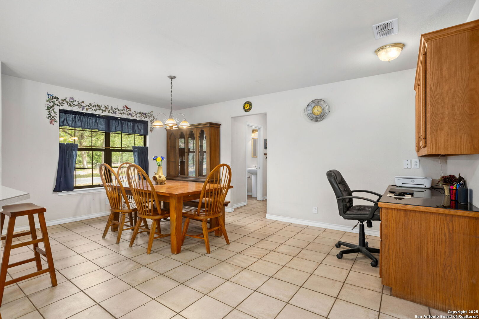 188 Guadalupe Ranch Lane Seguin, TX 78155 - Photo 18 of 40 a dining room with furniture and window