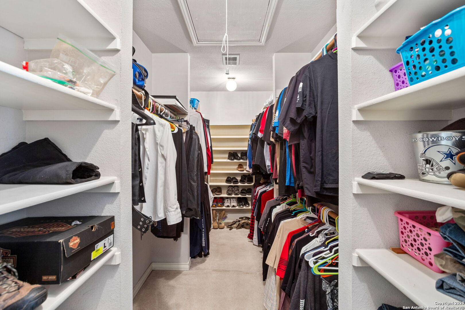 188 Guadalupe Ranch Lane Seguin, TX 78155 - Photo 32 of 40 a view of walk in closet with clothes and shoes