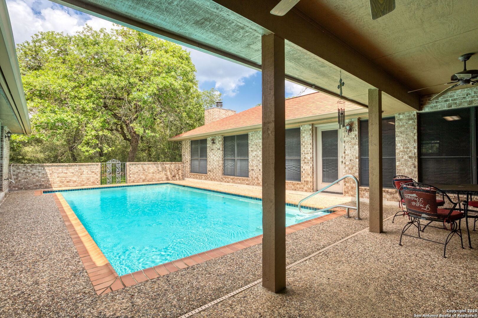 188 Guadalupe Ranch Lane Seguin, TX 78155 - Photo 34 of 40 a view of a swimming pool with a lounge chair
