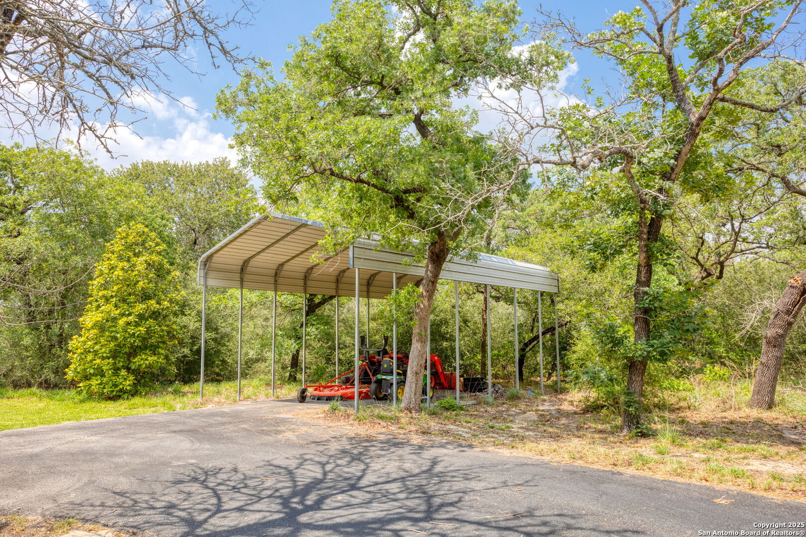 188 Guadalupe Ranch Lane Seguin, TX 78155 - Photo 36 of 40 a view of a patio with a tree