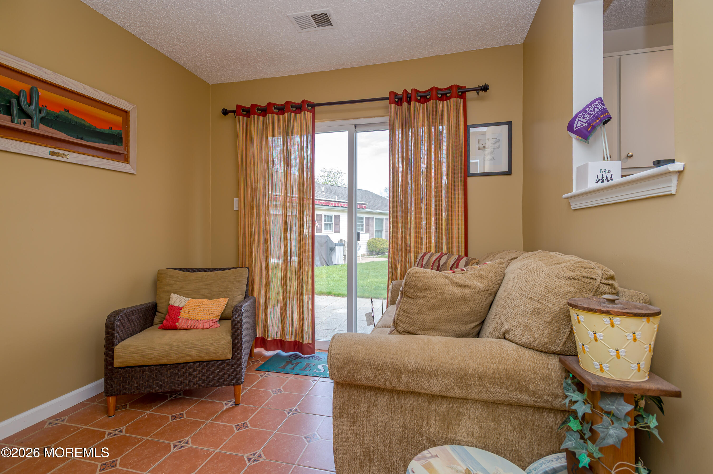 45 Datchet Close Freehold, NJ 07728 - Photo 14 of 22 a living room with furniture and a window