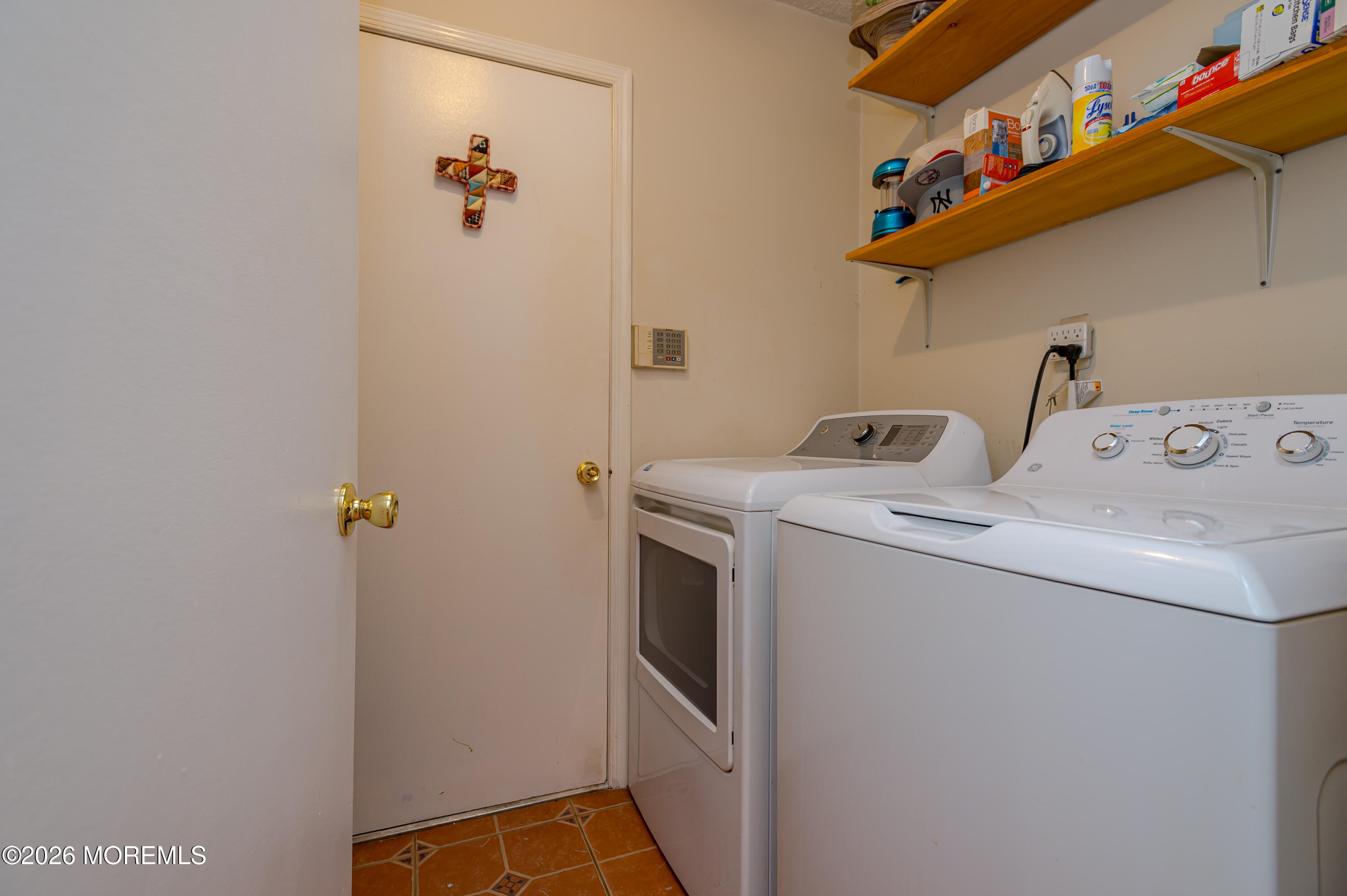 45 Datchet Close Freehold, NJ 07728 - Photo 20 of 22 a utility room with dryer and washer