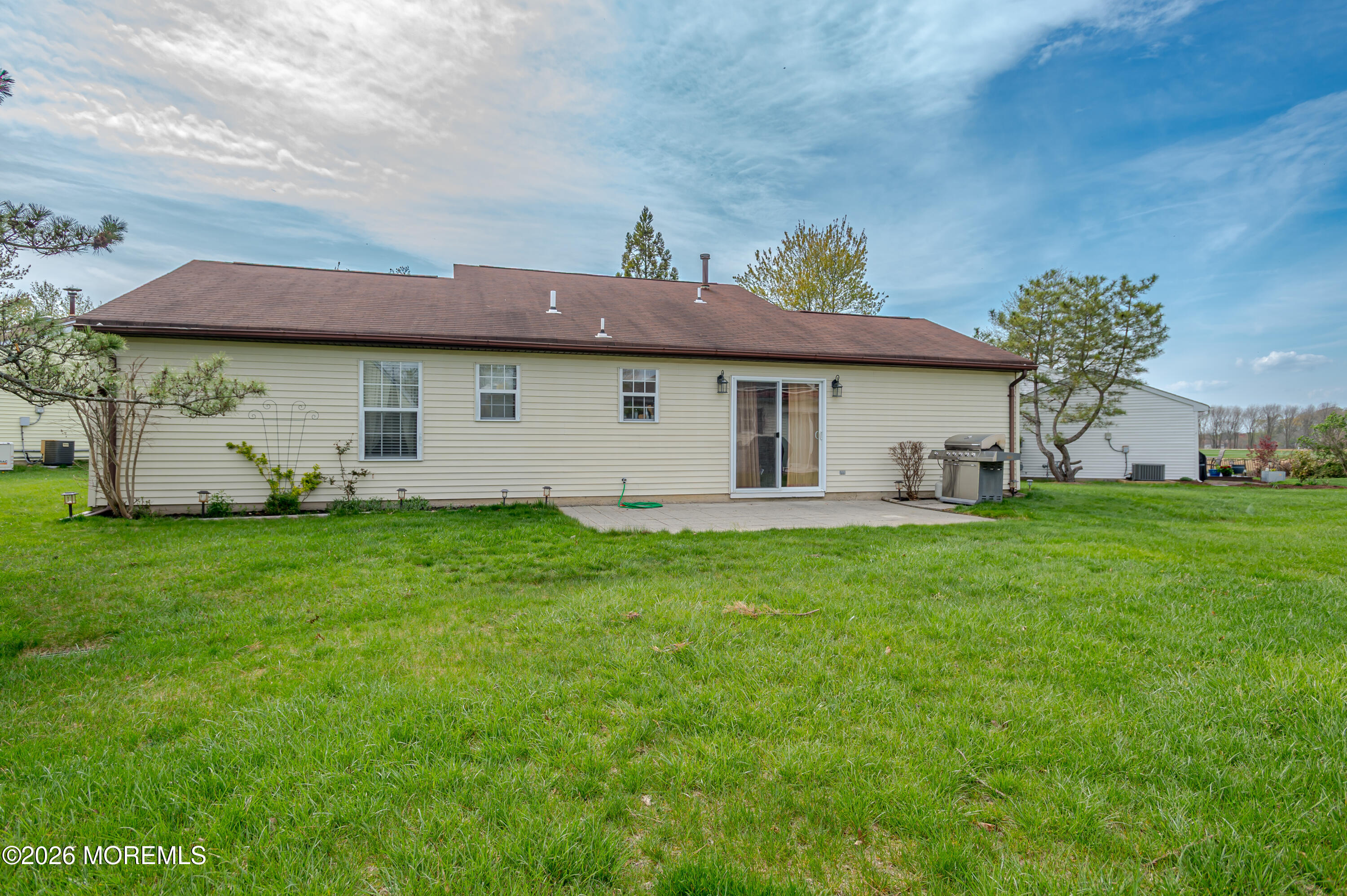 45 Datchet Close Freehold, NJ 07728 - Photo 21 of 22 a view of a house with backyard