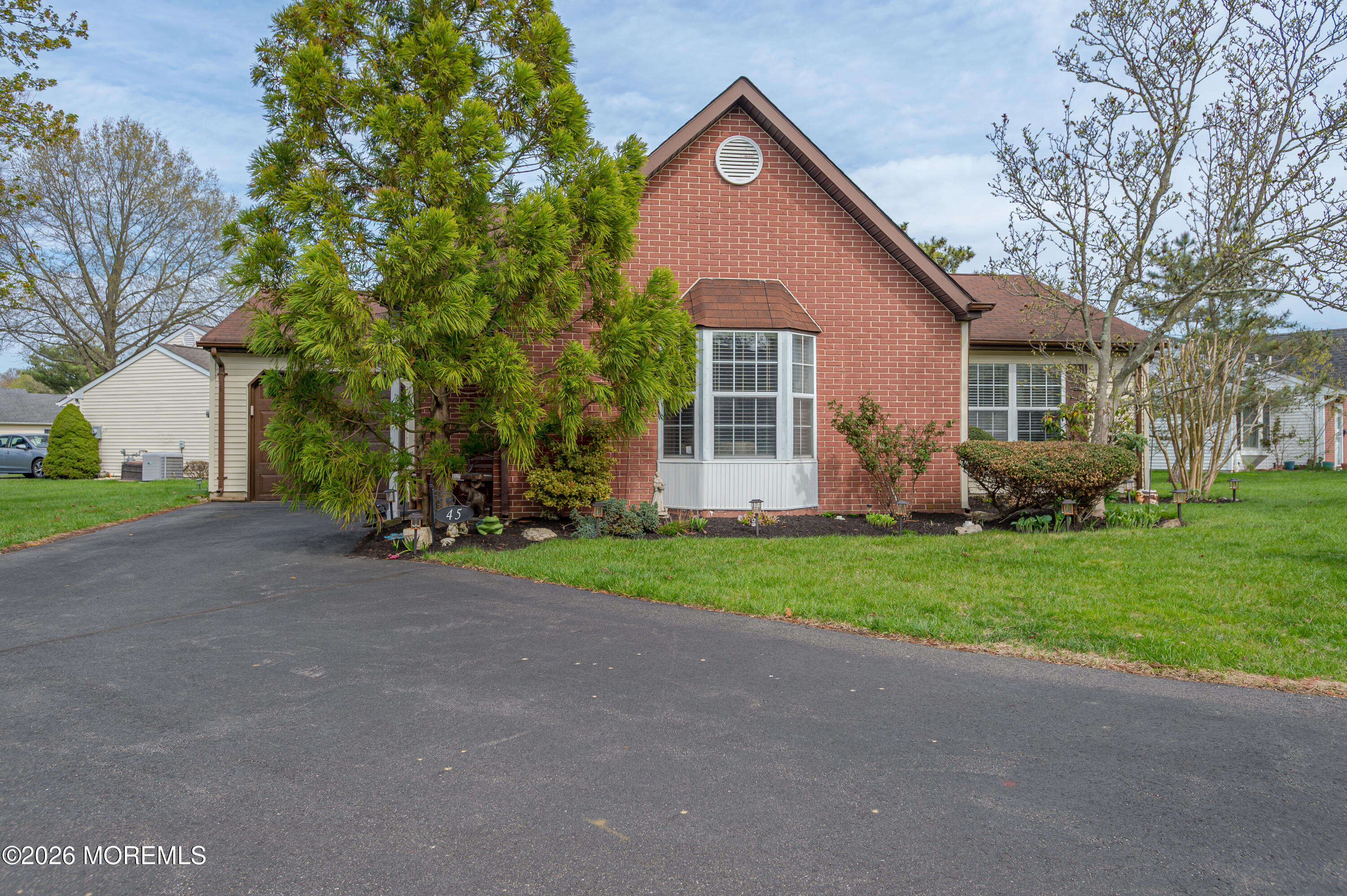 45 Datchet Close Freehold, NJ 07728 - Photo 22 of 22 a view of a house with backyard and garden