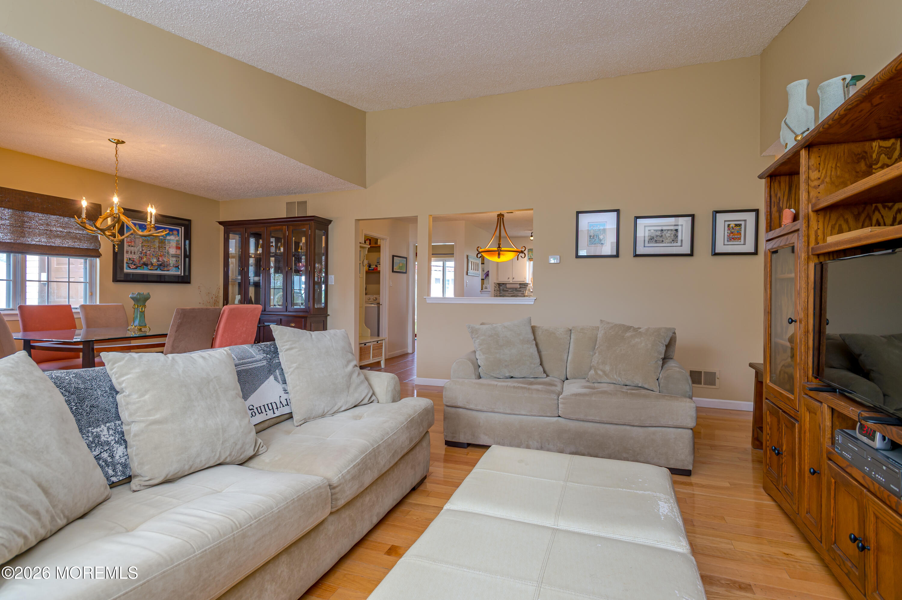 45 Datchet Close Freehold, NJ 07728 - Photo 5 of 22 a living room with furniture and a flat screen tv