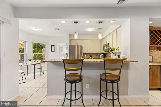 a dinning room and chairs in a room