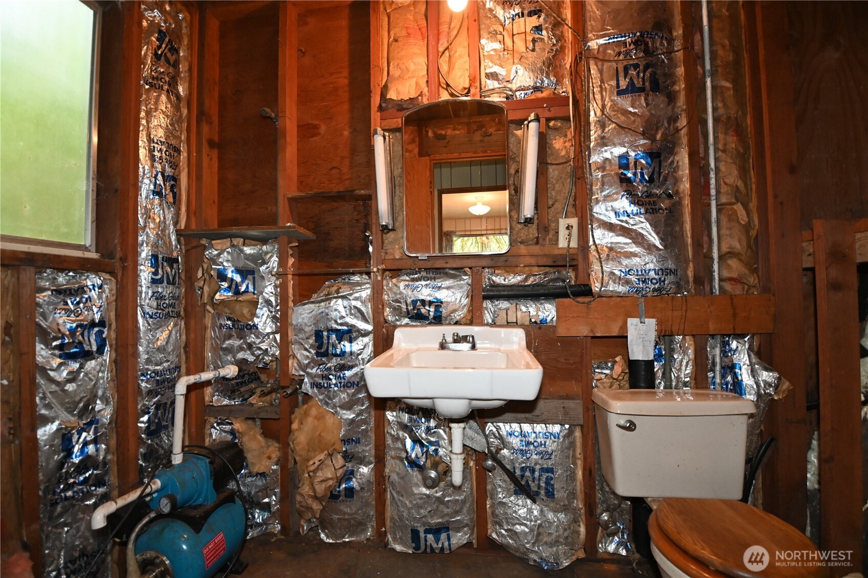 53009 South Riverside Road Gold Bar, WA 98251 - Photo 20 of 26 a bathroom with a sink toilet and mirror