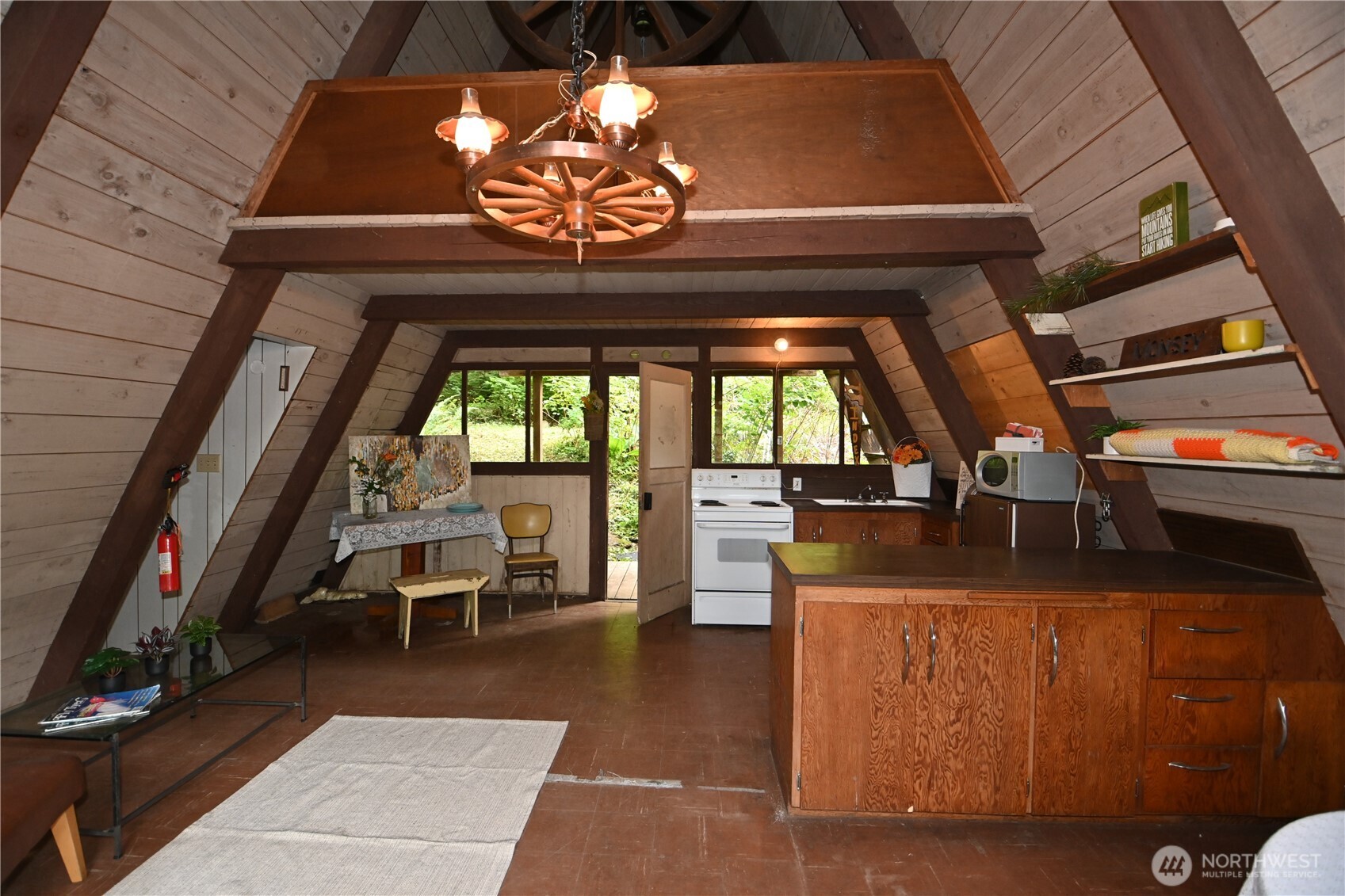 53009 South Riverside Road Gold Bar, WA 98251 - Photo 21 of 26 a view of a livingroom with furniture wooden floor chandelier