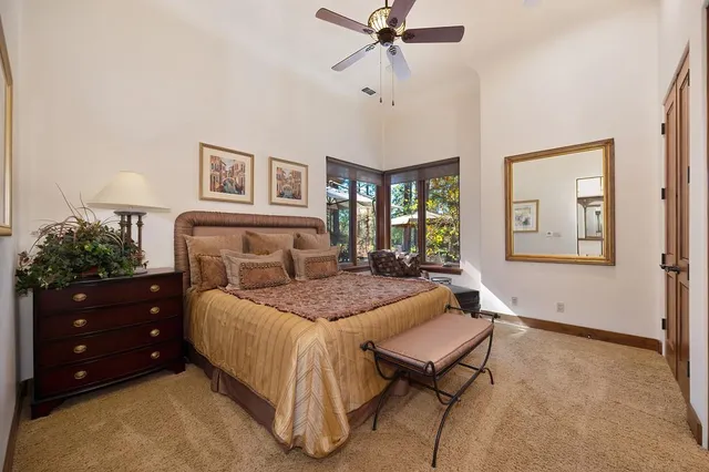 a view of a street with houses on both side