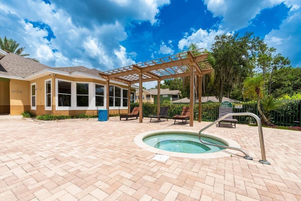 4332 South Kirkman Road, Unit 1012 Orlando, FL 32811 - Photo 15 of 20 a view of a house with backyard and sitting area