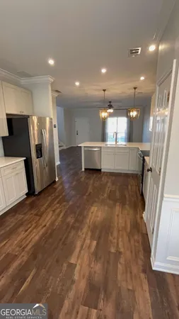 a view of balcony with wooden floor