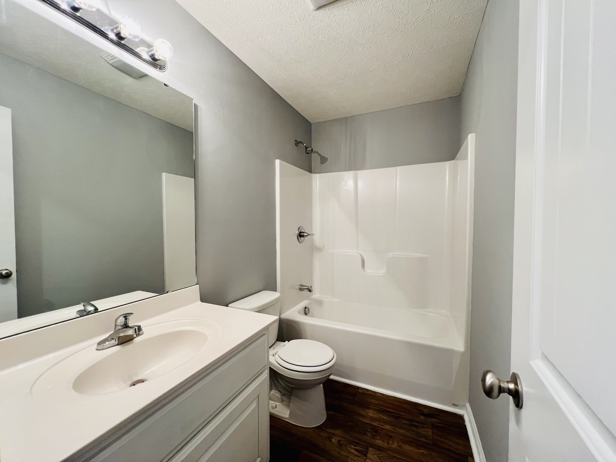 466 White Road Pulaski, TN 38478 - Photo 7 of 25 a bathroom with a sink toilet a shower and a mirror