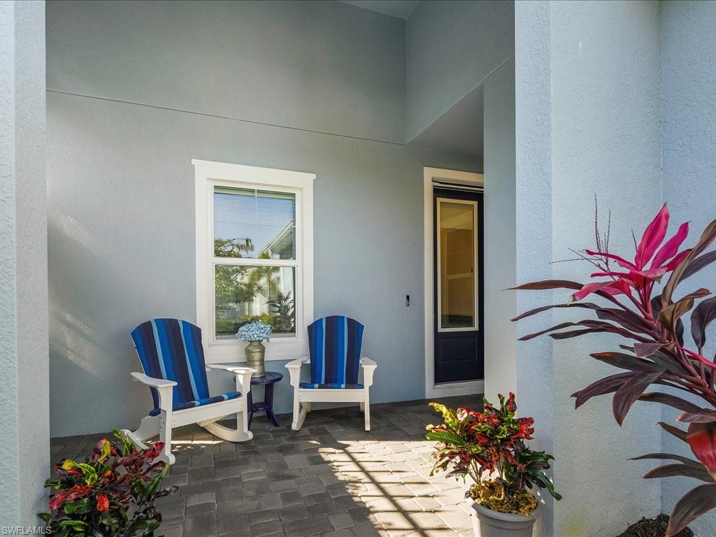 2227 Marquesa Circle Naples, FL 34112 - Photo 2 of 26 a living room with furniture