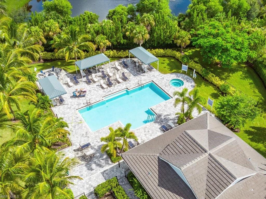 2227 Marquesa Circle Naples, FL 34112 - Photo 24 of 26 a view of yard from deck with patio