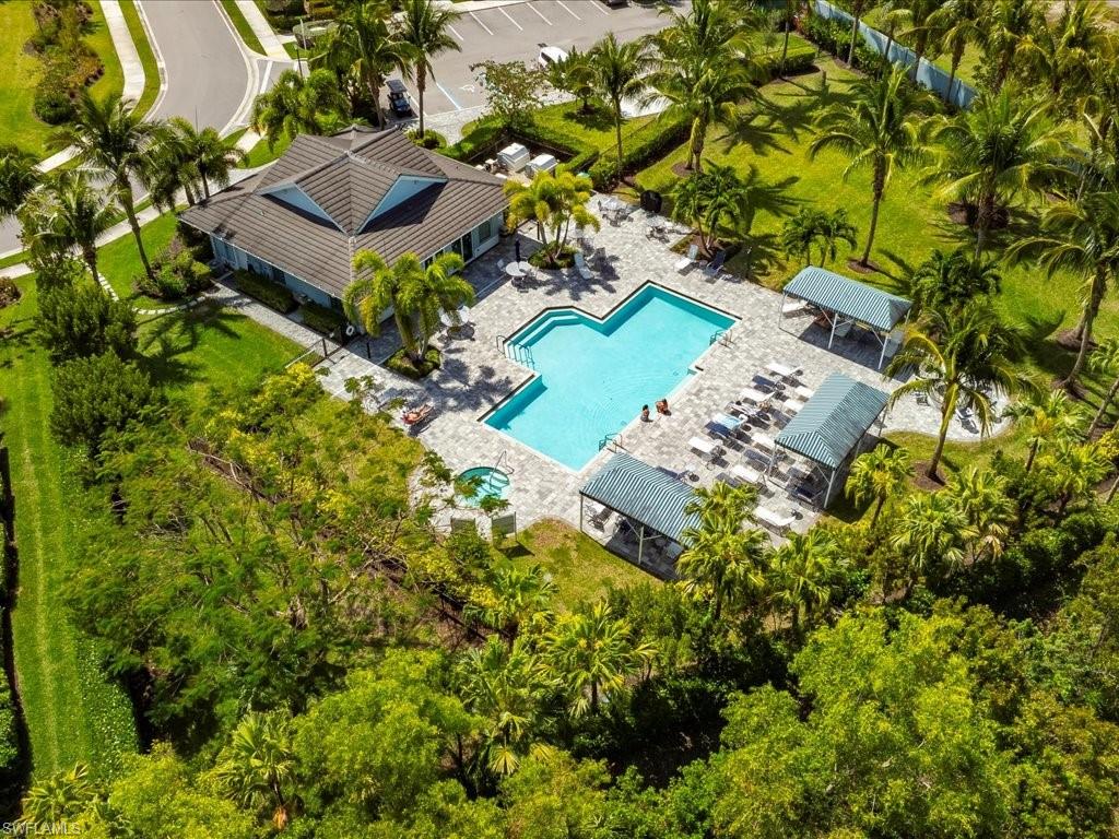 2227 Marquesa Circle Naples, FL 34112 - Photo 25 of 26 view of a house with a yard