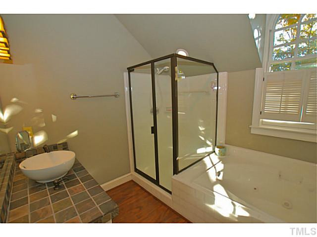 3217 Anderson Drive Raleigh, NC 27609 - Photo 16 of 25 Master bath has been wonderfully renovated with new tops, sinks and flooring. Whirlpool tub and sep shower! Master Bath/Spa