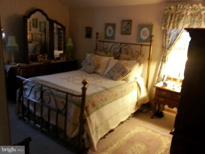 6 Bancroft Road Marlton, NJ 08053 - Photo 3 of 3 a bed sitting in a bedroom next to a window