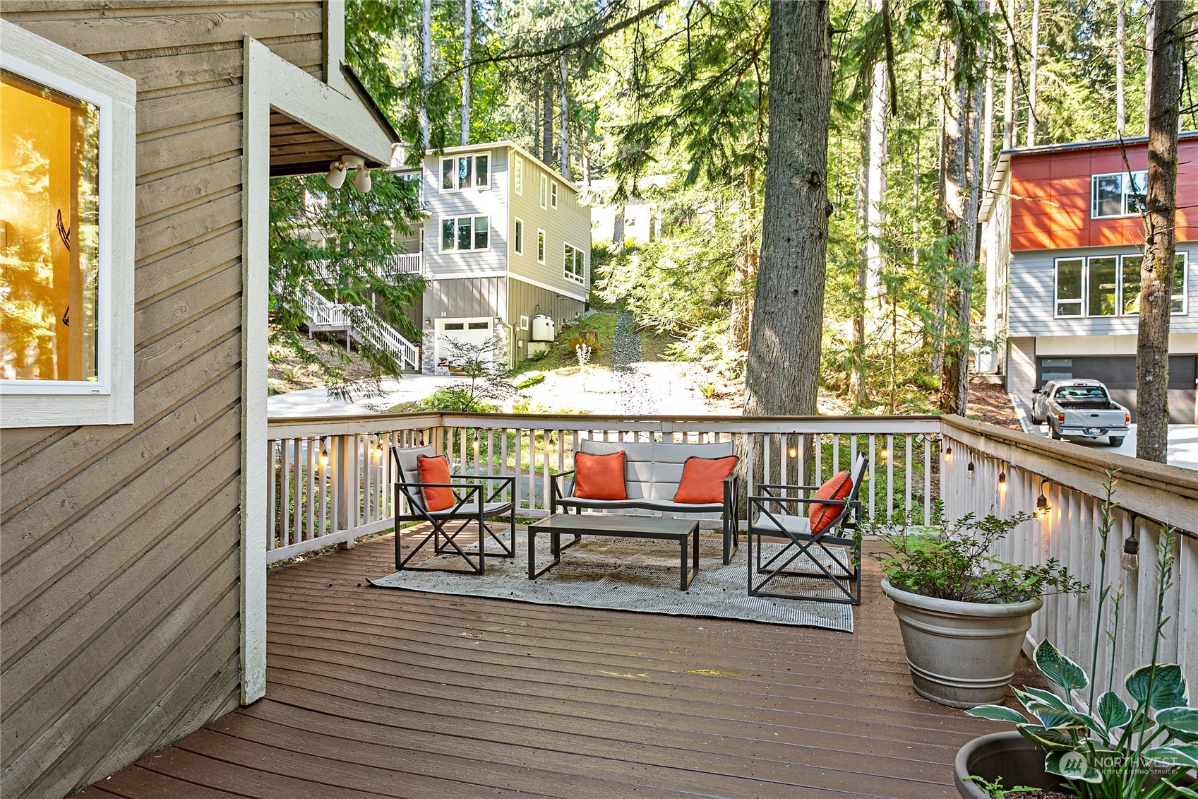 23 Hillside Place Bellingham, WA 98229 - Photo 30 of 39 a view of a chairs and table on the wooden deck