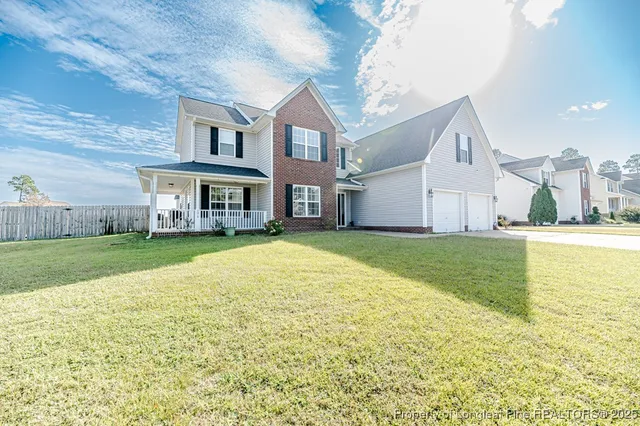 a view of a house with a swimming pool