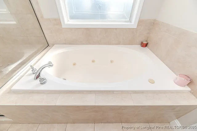 a bathroom with a bathtub