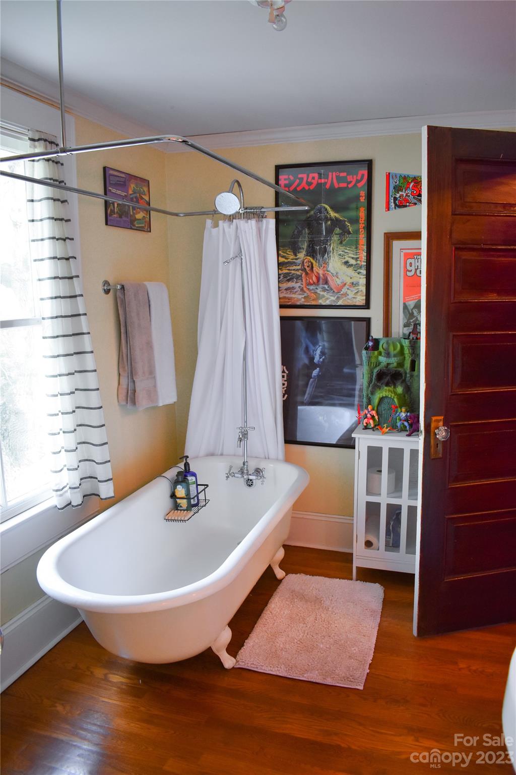 506 Main Street Southwest Lenoir, NC 28645 - Photo 18 of 29 a bath room with a table and a potted plant