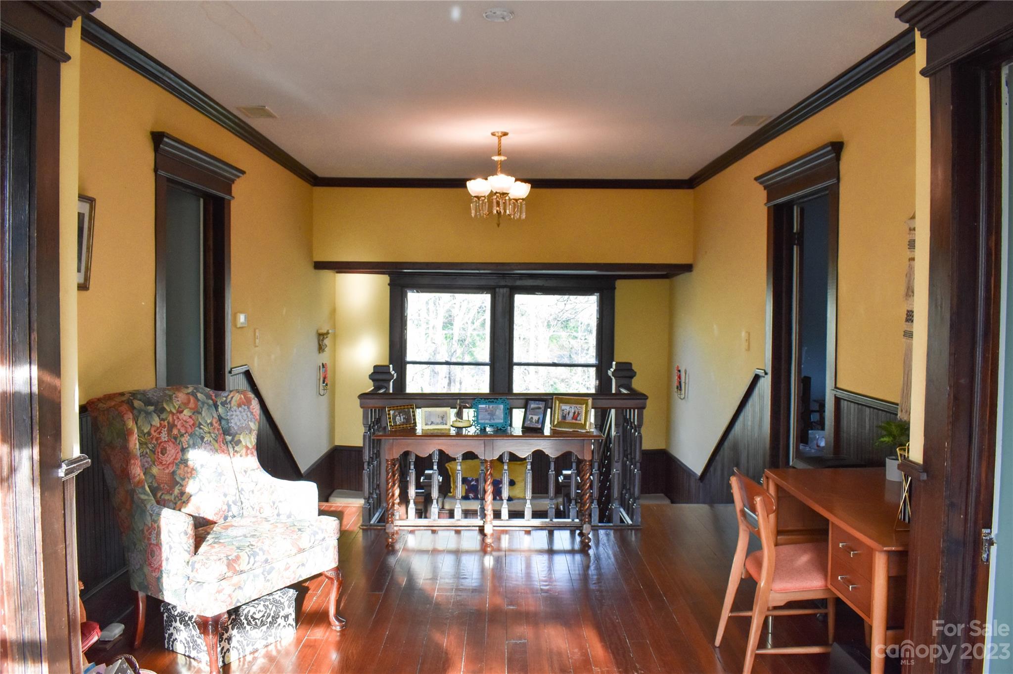 506 Main Street Southwest Lenoir, NC 28645 - Photo 25 of 29 a dining room with wooden floor table and chairs