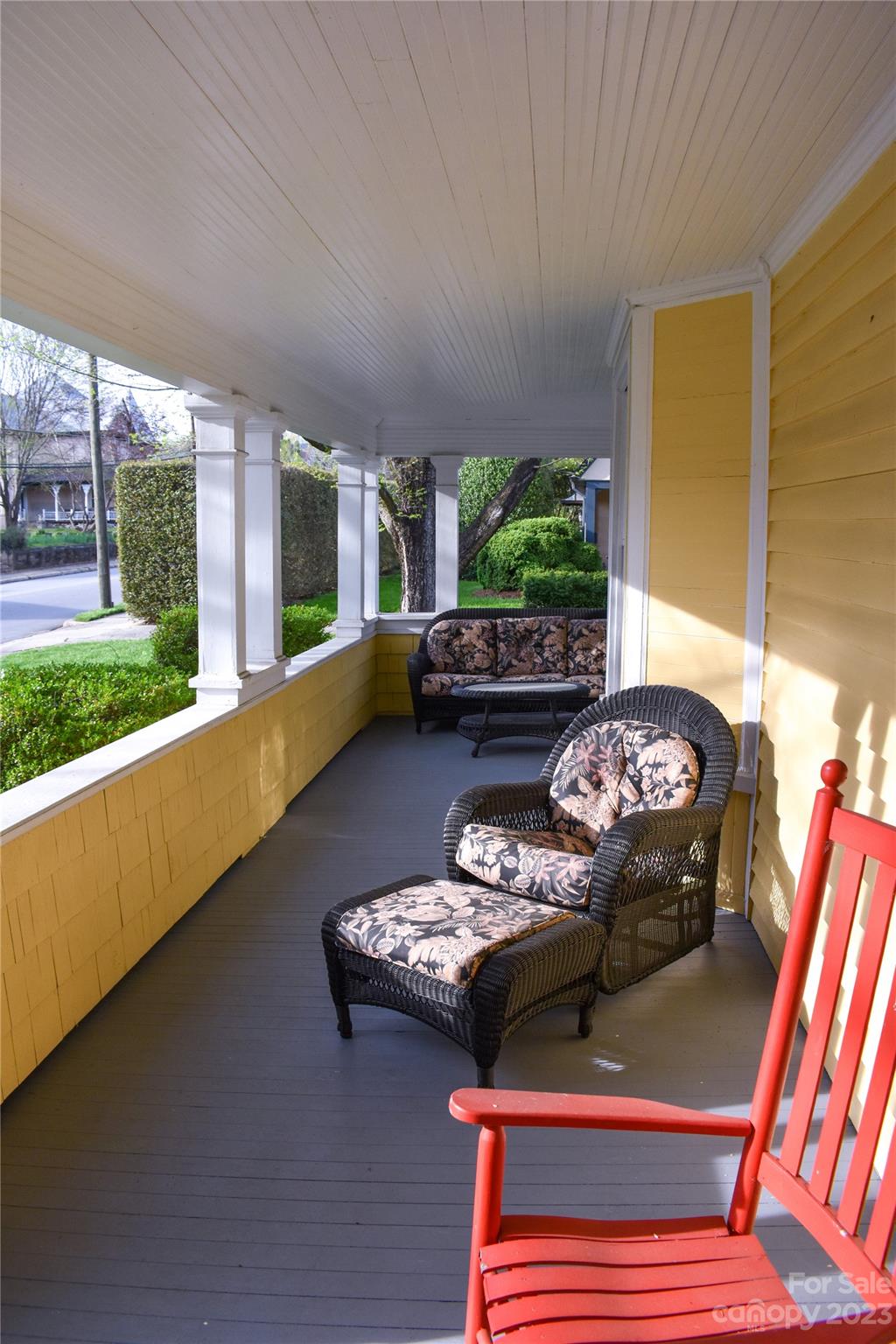 506 Main Street Southwest Lenoir, NC 28645 - Photo 8 of 29 a living room with furniture and a floor to ceiling window