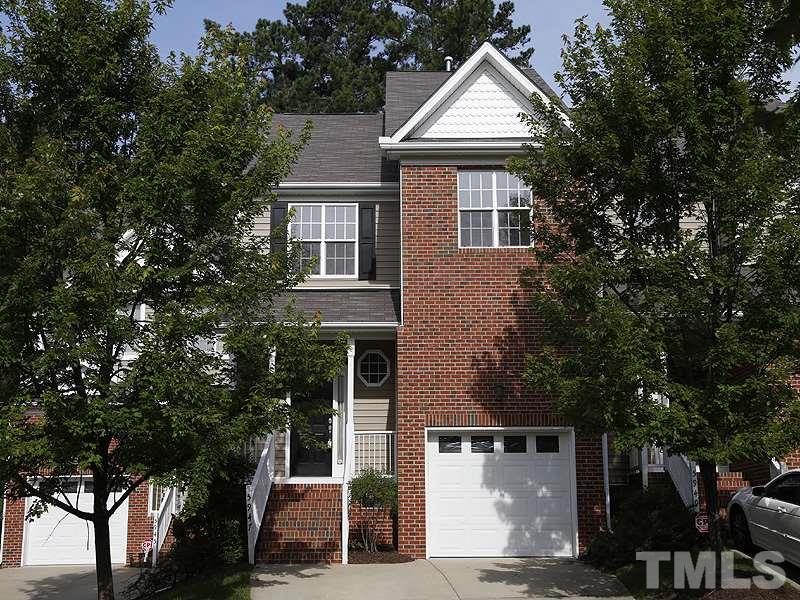 5947 Four Townes Lane Raleigh, NC 27616 - Photo 1 of 12 a view of house with a tree and front view of a house