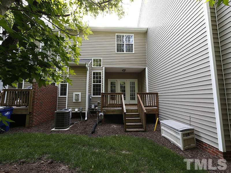 5947 Four Townes Lane Raleigh, NC 27616 - Photo 11 of 12 a view of a house with backyard