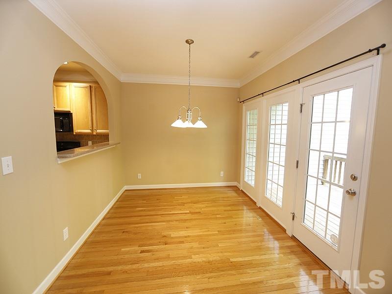 5947 Four Townes Lane Raleigh, NC 27616 - Photo 4 of 12 a view of a livingroom with wooden floor and a window