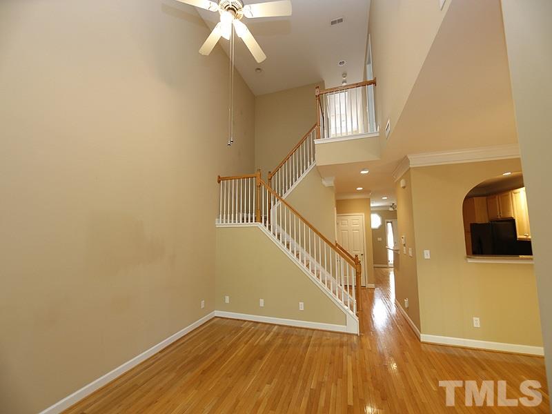 5947 Four Townes Lane Raleigh, NC 27616 - Photo 6 of 12 a view of an entryway with wooden floor