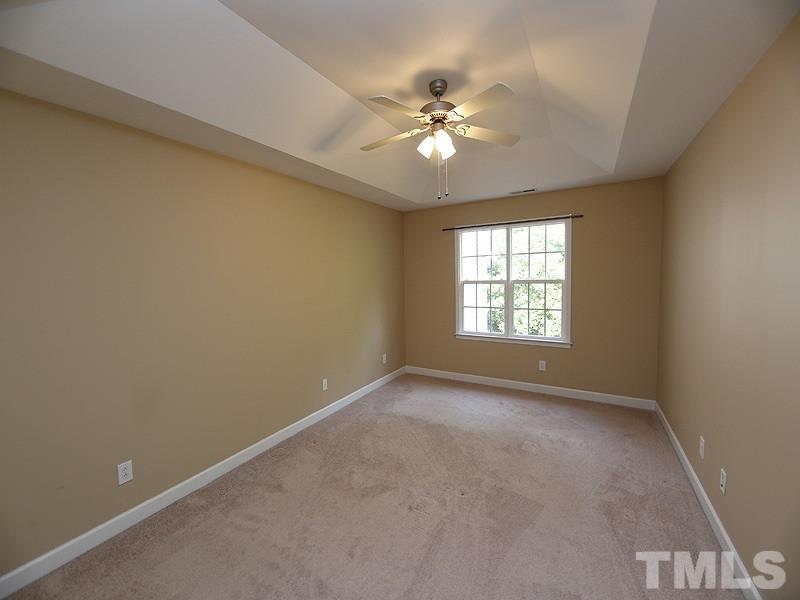 5947 Four Townes Lane Raleigh, NC 27616 - Photo 7 of 12 a view of an empty room with a window