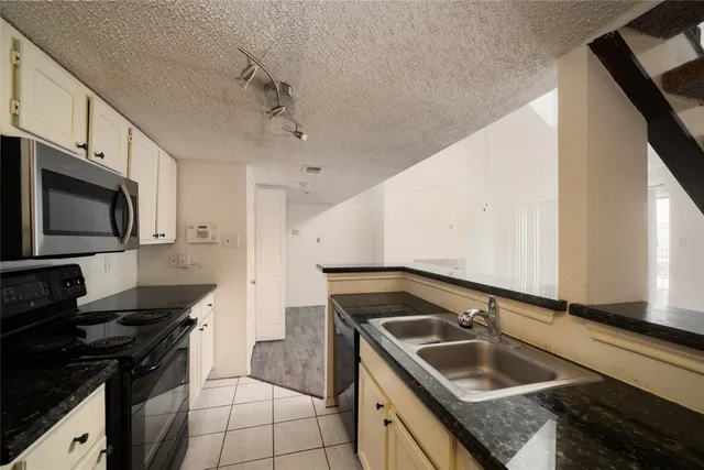 a view of a hallway with a bedroom