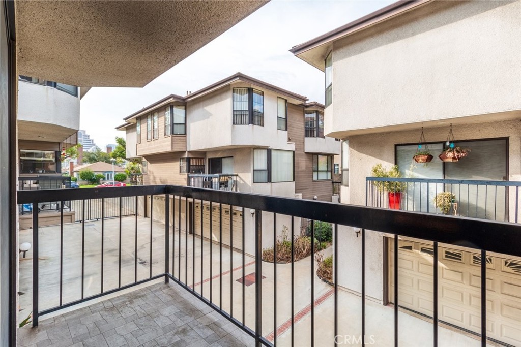 514 North Isabel Street, Unit C Glendale, CA 91206 - Photo 28 of 36 a view of a white house with large windows