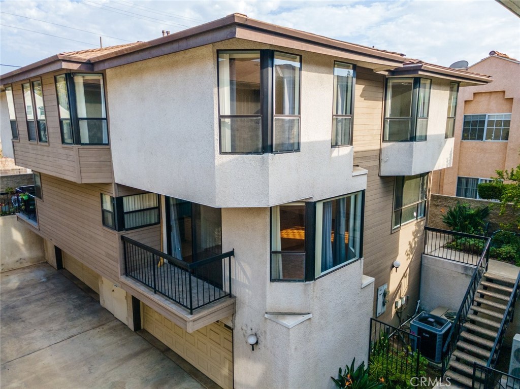 514 North Isabel Street, Unit C Glendale, CA 91206 - Photo 31 of 36 a front view of a house with stairs