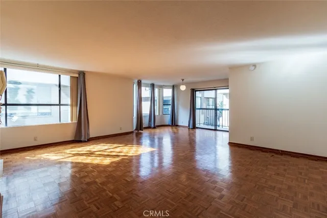 a view of a livingroom with wooden floor