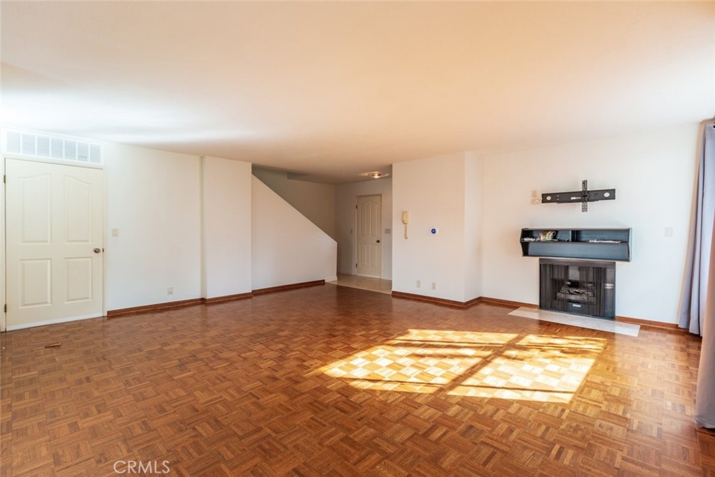 514 North Isabel Street, Unit C Glendale, CA 91206 - Photo 8 of 36 a view of a livingroom with wooden floor