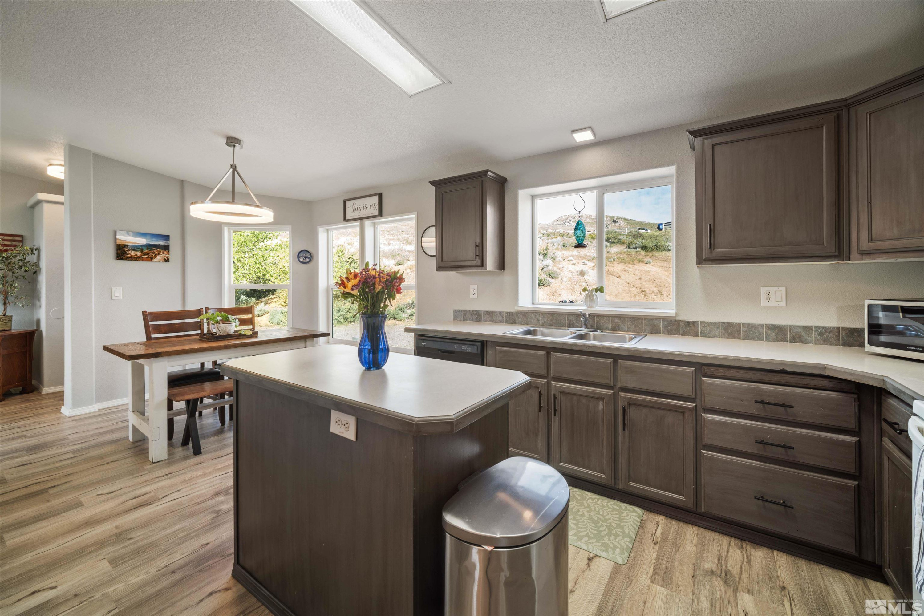 13705 North Red Rock Road Reno, NV 89508 - Photo 14 of 46 a kitchen with sink and cabinets