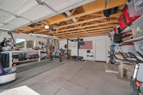 a view of a bike storage and utility room
