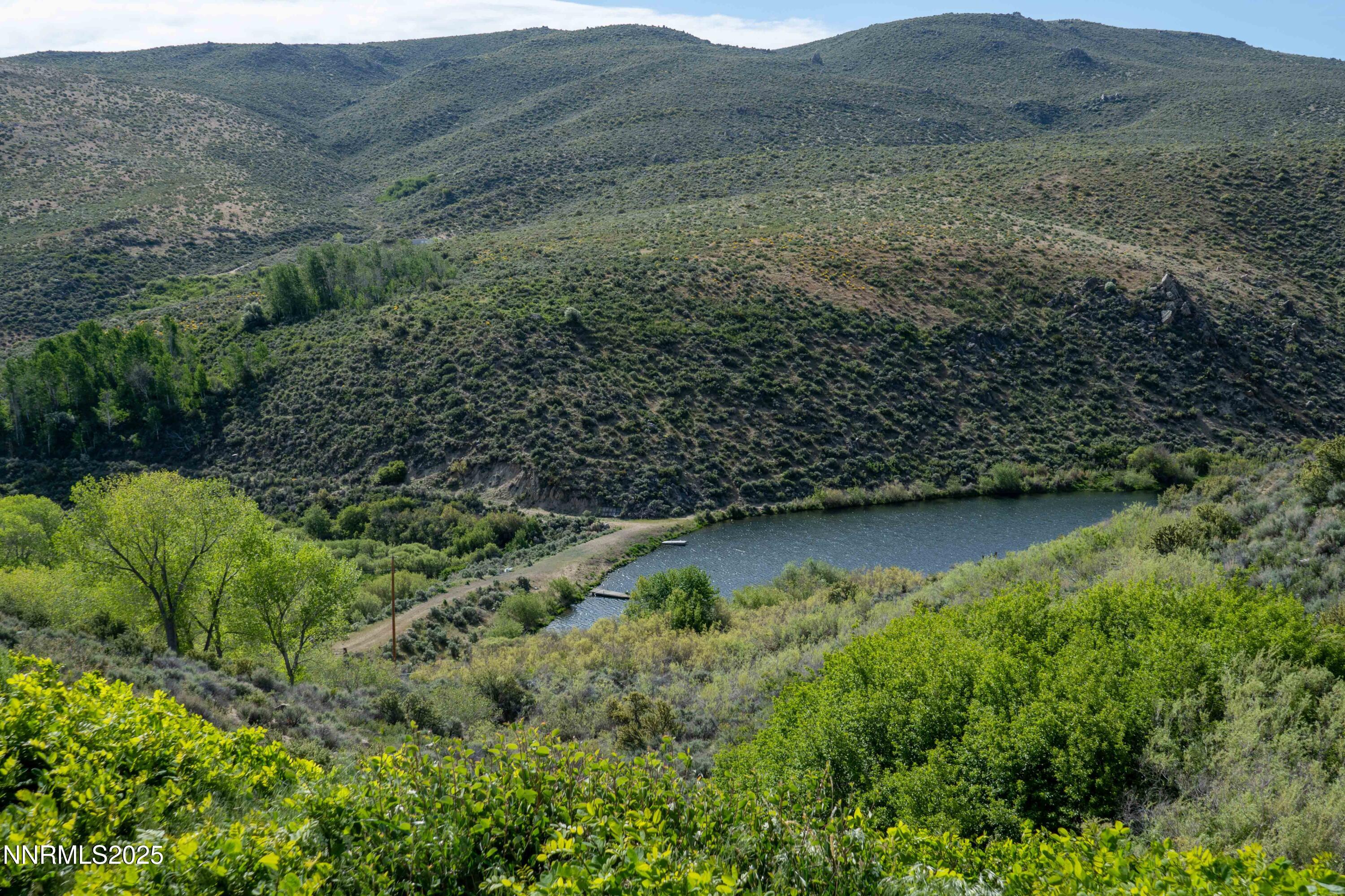 13705 North Red Rock Road Reno, NV 89508 - Photo 45 of 46 a view of a lush green field
