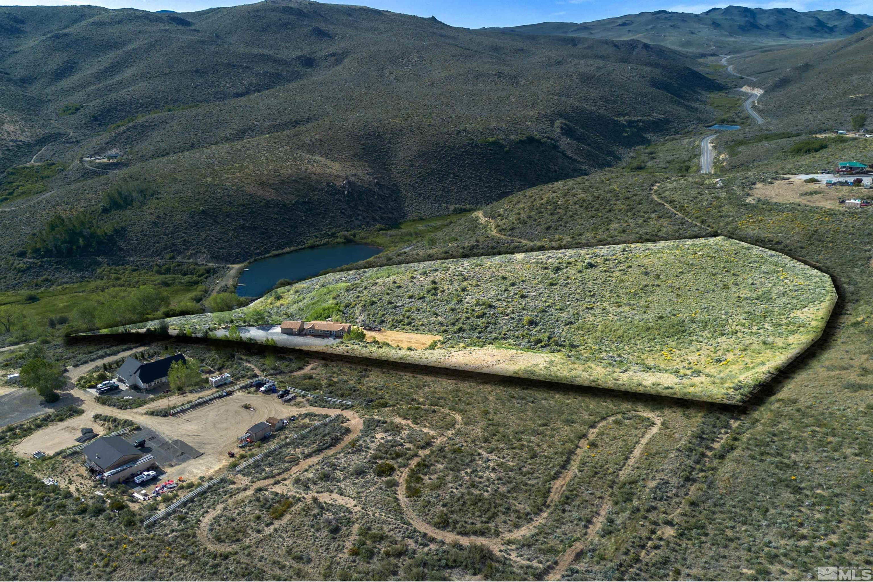 13705 North Red Rock Road Reno, NV 89508 - Photo 46 of 46 an aerial view of a house with a yard