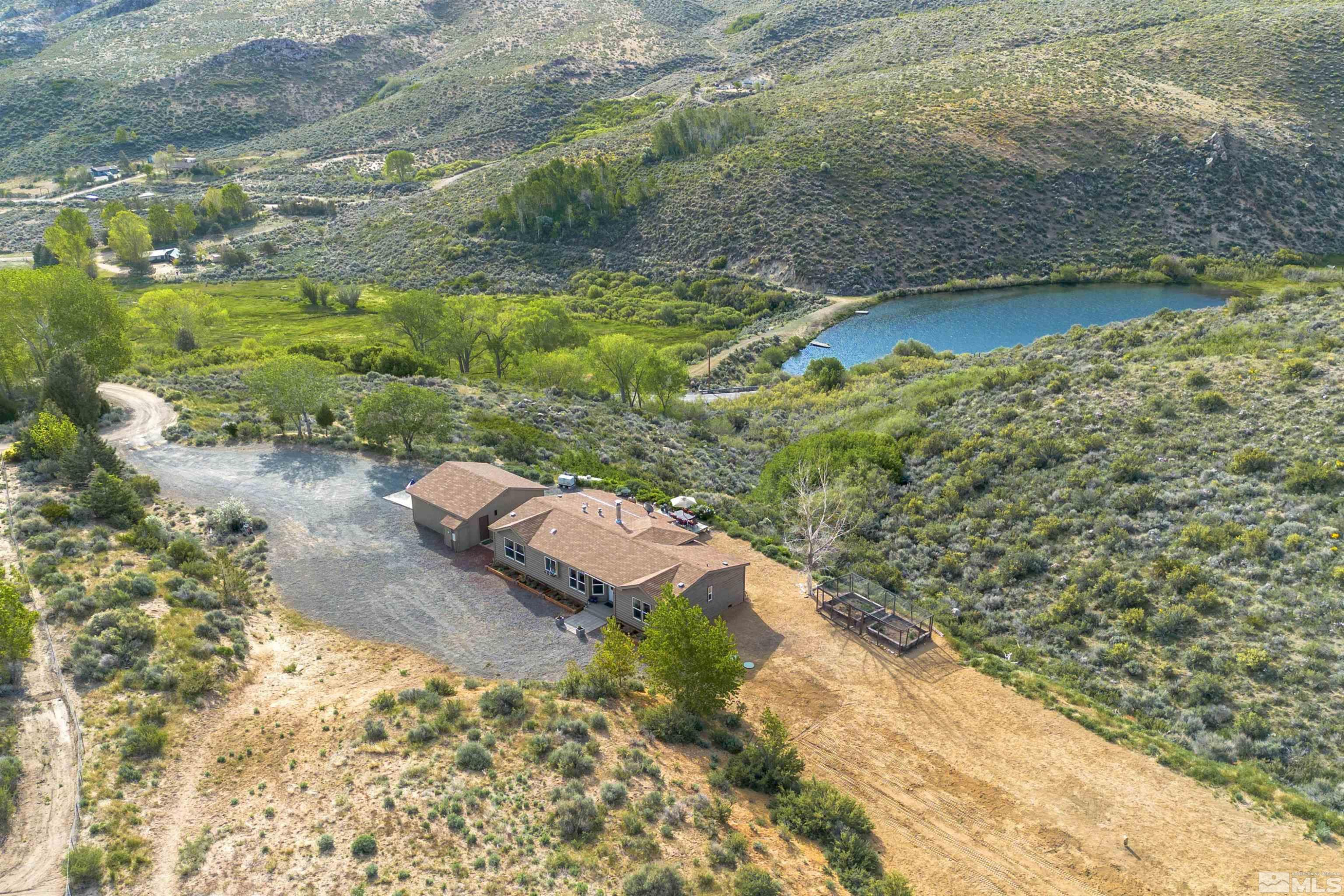 13705 North Red Rock Road Reno, NV 89508 - Photo 6 of 46 a view of lake view with large trees