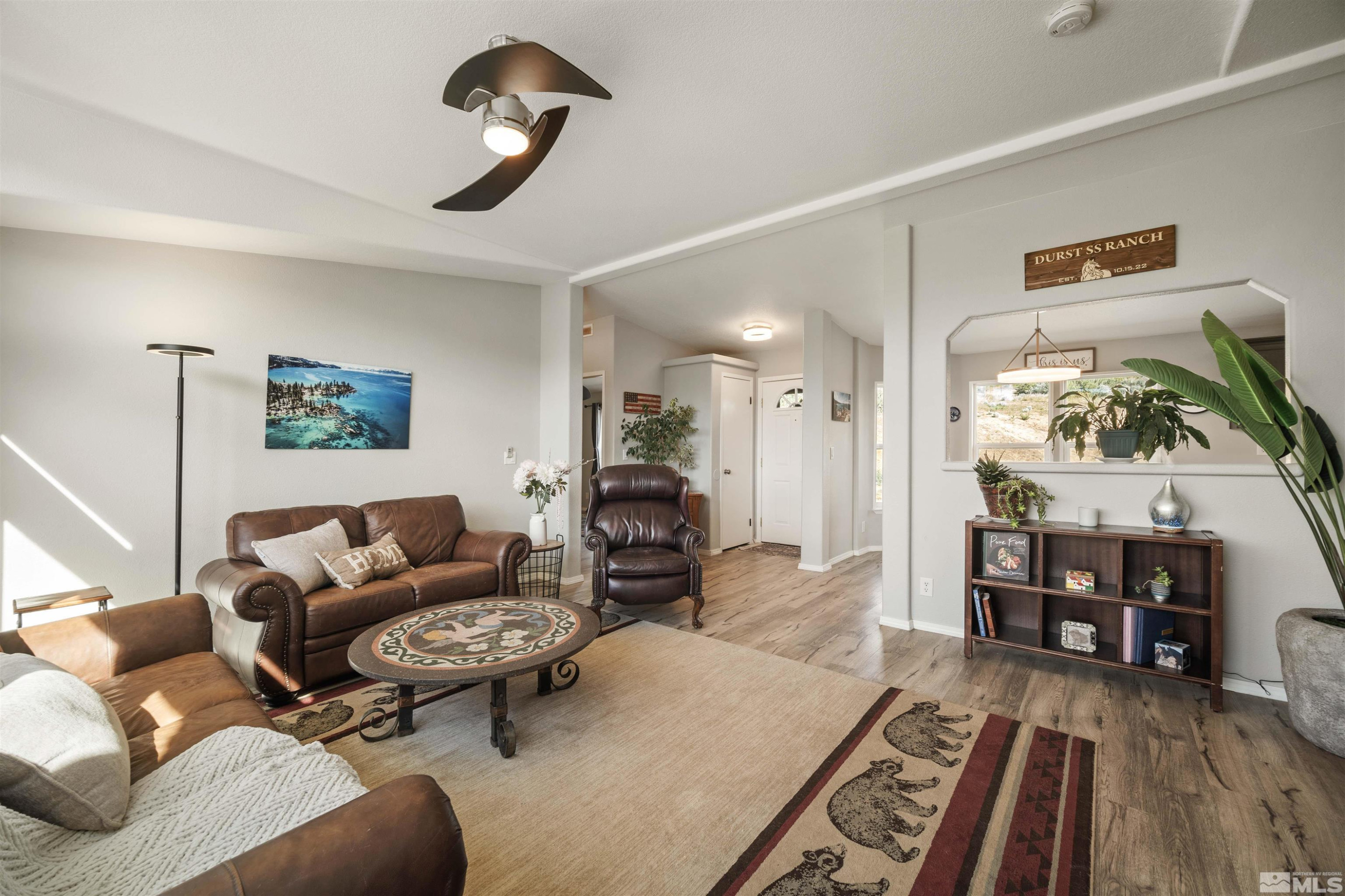 13705 North Red Rock Road Reno, NV 89508 - Photo 9 of 46 a living room with furniture and wooden floor